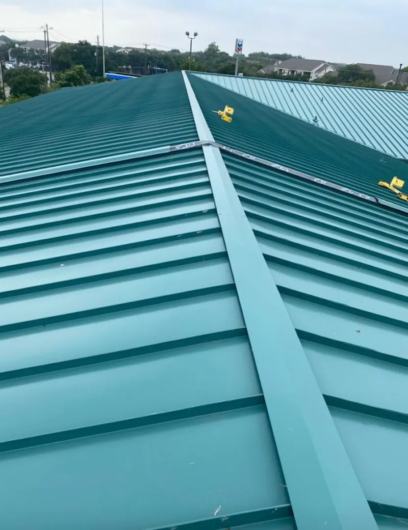 Green commercial metal roof ridge and valley for Metal Roof Repair in Country Walk